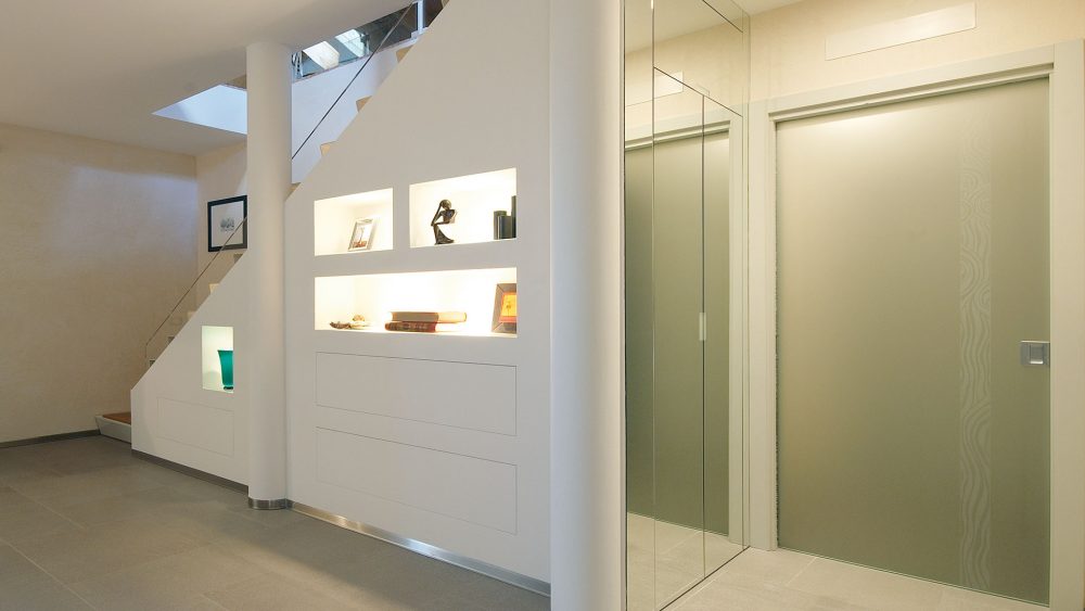 Sistema di chiusura a filo muro T100 1 Anta Orizzontale MDF Sistemi Rasoparete